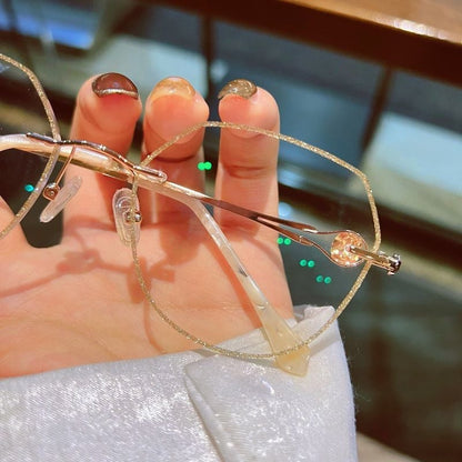 Női keret nélküli szemüveg gyémánt mintával, amely védelmet nyújt a kék fény és a presbyopia ellen
